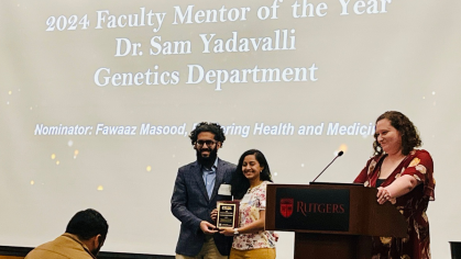 Dr. Yadavalli receiving her award