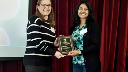 Dr. Yadavalli receiving her award